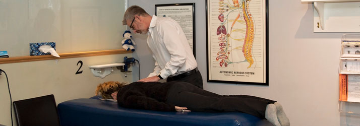 Chiropractor Peterborough ON Dr. Ed Jindrich Adjusting Patient Chiropractor Peterborough ON Dr. Ed Jindrich Adjusting Patient